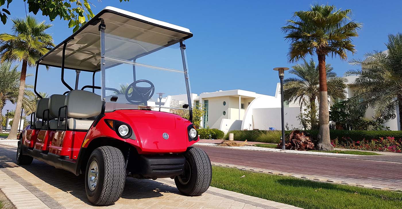 Golf cart in front of house in bahrain